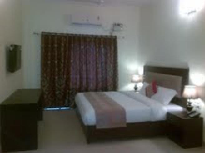 Chitra Grand Hotel Haridwār Habitación foto